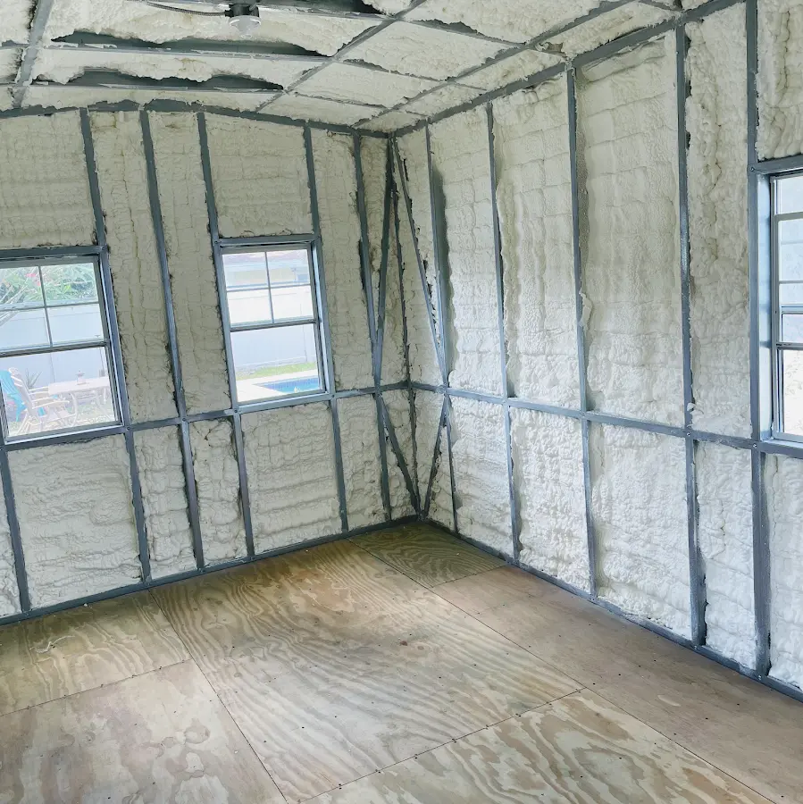 Closed-cell spray foam insulation applied to wall cavities in a residential project in Winter Beach
